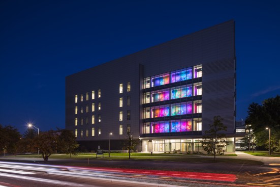 The mural cements the building as an icon amid the campus fabric of Michigan State University.