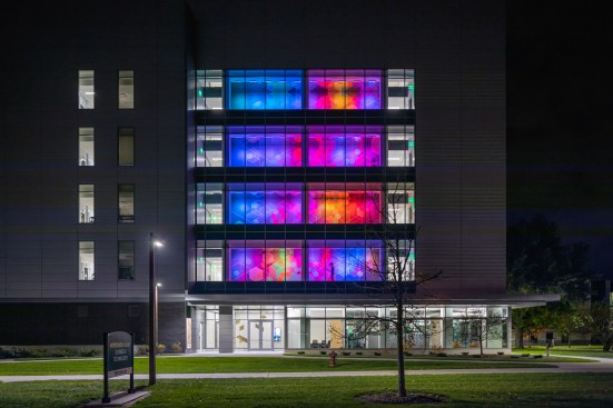 Custom light shows continually transform the mural’s appearance.