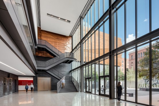 The copper cladding continues into the museum at the courtyard, creating continuity between the exterior and interior.