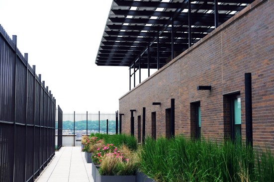 BRC worked with Bright Power to integrate a 114kW solar photovoltaic system on the roof of the Apartments at Landing Road building.