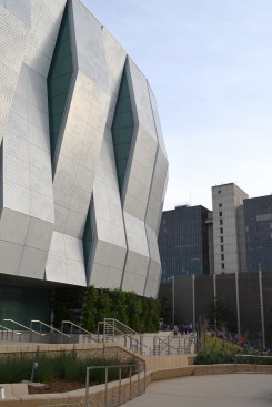 The faceted metal cladding allow natural light into the arena through vertical glazing and perforations.