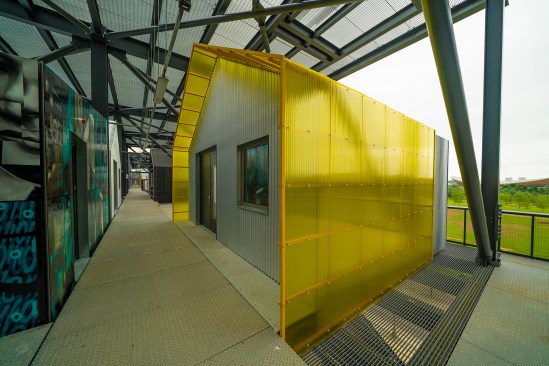 Here East Gantry's plot 12 draws from the iconic yellow box packaging for Lesney Matchbox toys