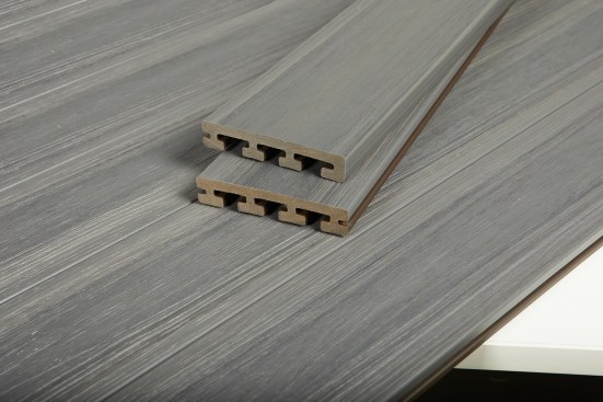 Available in several unique finishes such as this Cape Town Grey, Fortress Building Products I-Series composite decking can compliment any landscape d