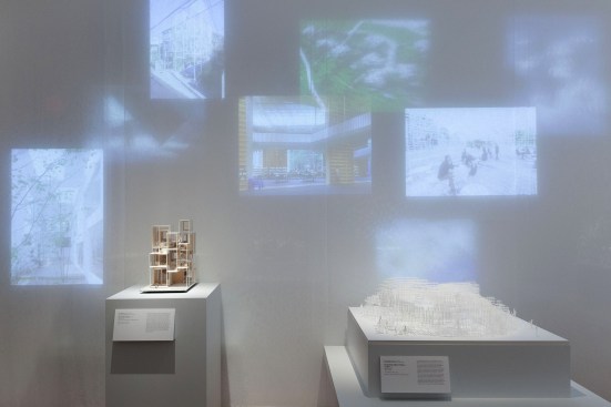 Exhibit detail (model of Na House on left)