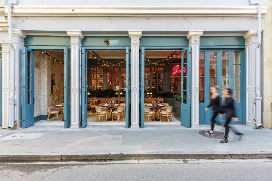 The firm aimed to emulate the ambience of Parisian brasseries for the vibrant interiors of Justine, a restaurant in the French Quarter of New Orleans.