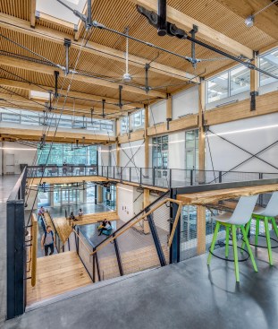 Ceiling fans and radiant concrete topping slabs help condition the interior of the Kendeda Building for Innovative Sustainable Design.