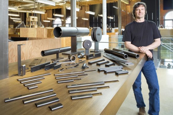 Seattle-based architect Tom Kundig stands with products from his line of interior hardware, furniture, and, most recently, luminaires.