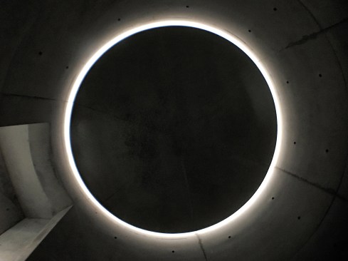 Floating ceiling: A concrete disc hovers below a skylight at the Ando Museum by Tadao Ando, Naoshima, Japan, 2013.