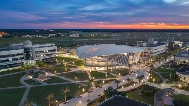The student union sits at the center of campus on the edge of Daytona Beach International Airport. Exterior pathway lighting connects campus precincts to the Union.