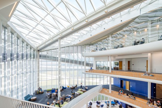 A 200-foot-long skylight illuminates the student commons and adjacent library.