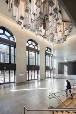 "The Hive," a scaled version of a global metropolis by the artists Elmgreen & Dragset, is suspended from the ceiling in Moynihan
