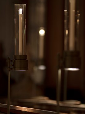The bespoke candlelike luminaires are designed to improve conditions for reading music while creating a soft sparkle reminiscent of a flame.