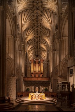 The lighting scene enhances the liturgical and spiritual aspects in the nave.