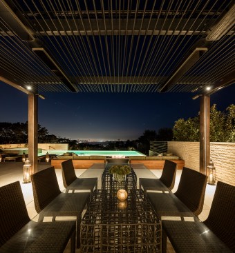 Lighting details provide visibility for safety and dining activities while preserving views of the coastline.