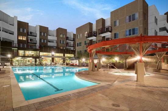 The Crossing features contemporary, urban architecture and resort-style amenities such as an outdoor pool and health club-quality fitness center and yoga studio.