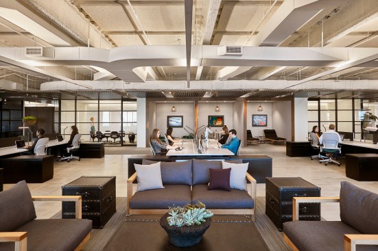 For Potamus Trading’s headquarters in Boston, Elkus Manfredi Architects indirectly illuminated surfaces with concealed fixtures, blurring the lines between daylighted and electrically lighted spaces. Pendants in the breakout spaces “add focus and sparkle.”