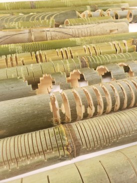 The UT student collaborators behind Reflex made kerf cuts into 7- to 12-foot-long bamboo poles.