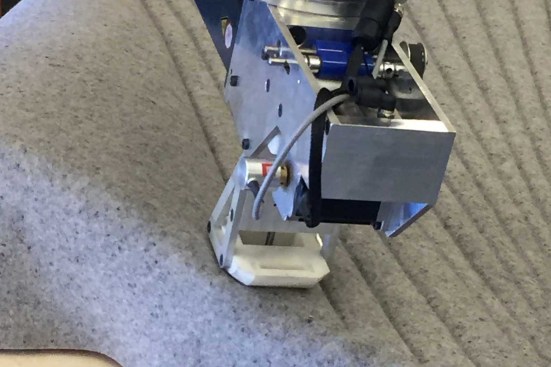 Robotic needle felting process on an acoustic panel