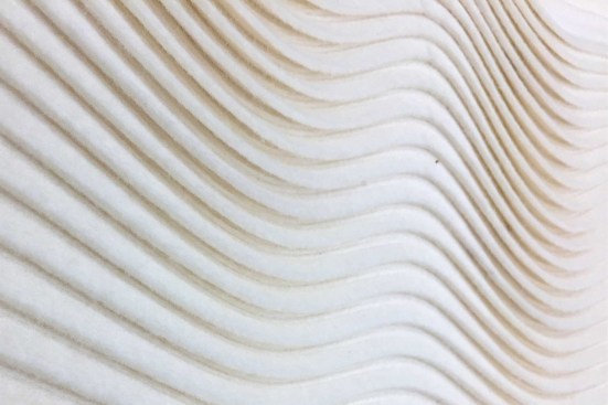 Wavy shiplapped pattern with texture created by a "lift" of the curved lines