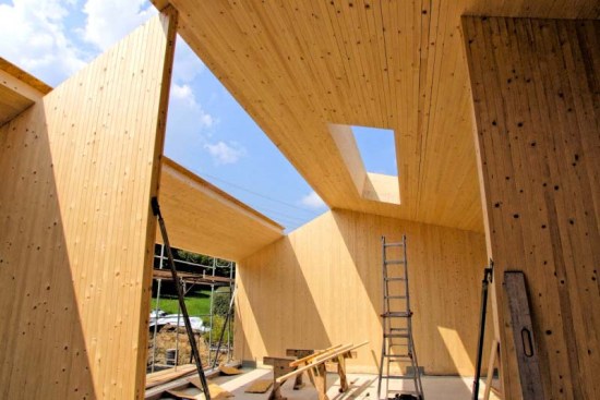 A wall and roof assemby being constructed out of dowel-laminated timber
