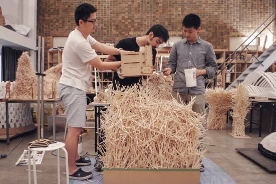 Students in the Advanced Design Studies laboratory at the University of Tokyo developed handheld 3D printers that progressively automated the dissemination and gluing of chopsticks for their Smart Tool Integrated Konstruction pavilion.