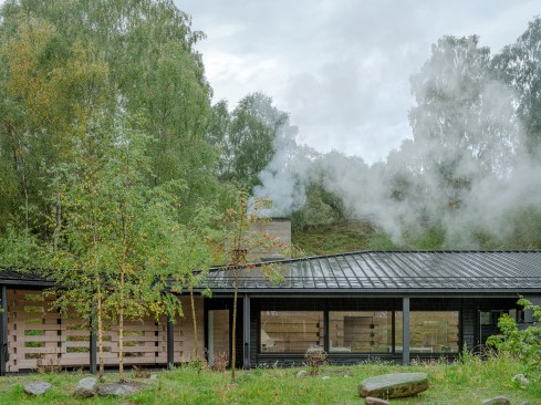 The Douglas fir wall transitions from the covered walkway into Moxon Architects design studio.