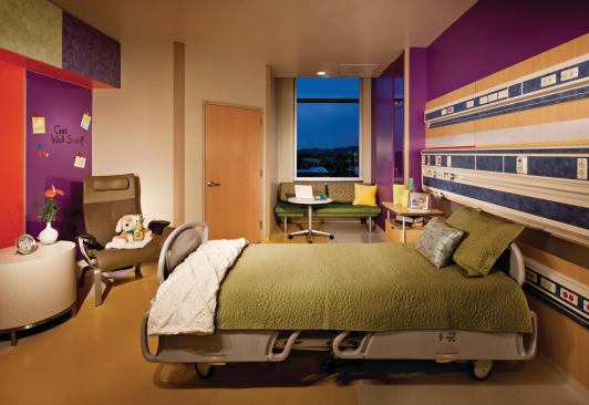 Private, single-patient rooms at Phoenix Children's Hospital provide views of the surrounding mountains through high-performance, low-E windows, and sun-shading screens help control daylight.
