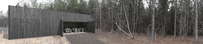 Charred and oiled cypress clads an under-construction bunkhouse and cabin in Caddo Gap, Ark.