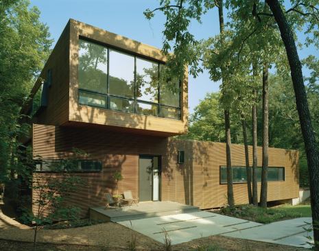 A rainscreen of Brazilian hardwood clads the L-Stack House.