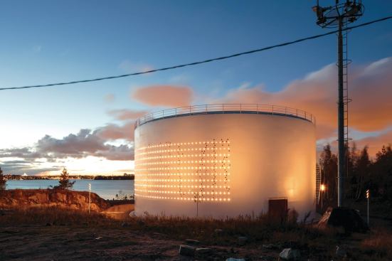 Silo 468, a permanent art installation and public space by Lighting Design Collective, has become a literal beacon of light for the redevelopment of Kruunuvuorenranta, a once-thriving oil port in Helsinki, Finland.
