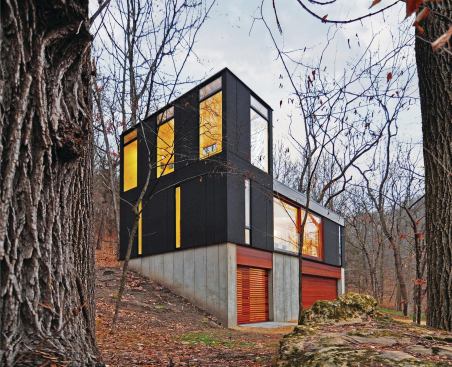 To minimize footprint and budget, Stacked Cabin arranges organizes spaces vertically.