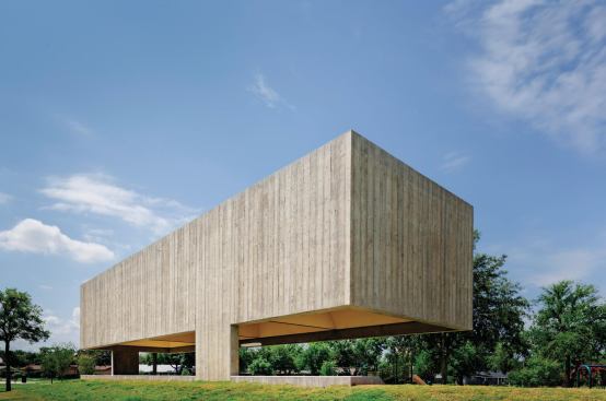 The cantilvered structure sits on just three structural piers, allowing for sightlines across the park.