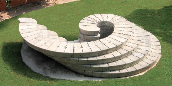 In this concrete installation, Ponce de Leon's studio at Georgia Tech used horizontal and interlocking connections between seven unique modules to challenge traditional logic for a corbelled system. The strategic stacking pattern and connections allowed for drastic extensions of the offset.