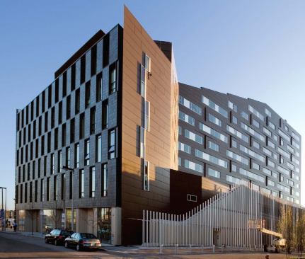 Tucked beneath the building is a 150,000-square-foot parking garage . 