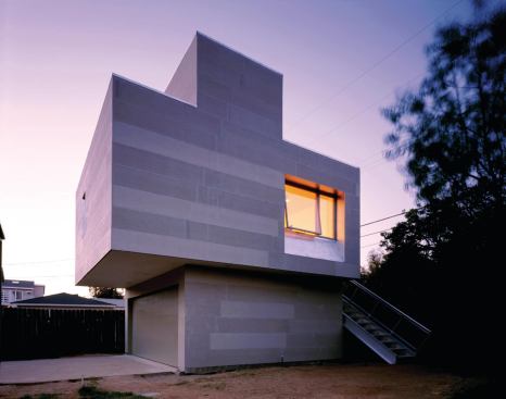 Walden Wilson in Culver City, Calif., an 800-square-foot studio and garage completed in 2003, features a baffled skylight and an exterior clad in cement fiber board panels. 