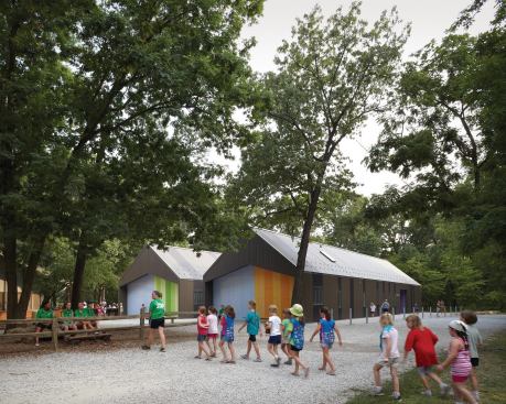 Girl Scouts arriving to the Trail Center at Camp Prairie Schooner.