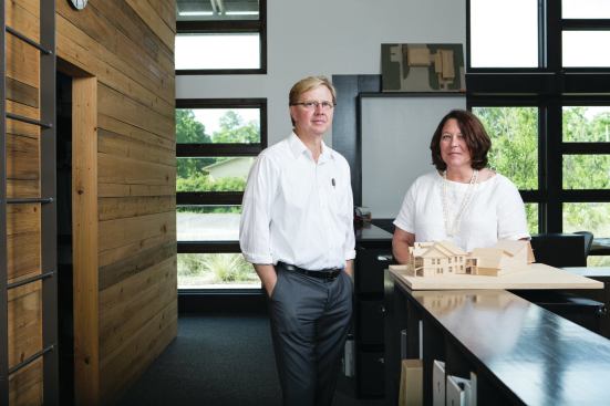John and Allison Anderson in the Bay St. Louis, Miss., office of their firm Unabridged Architecture. 