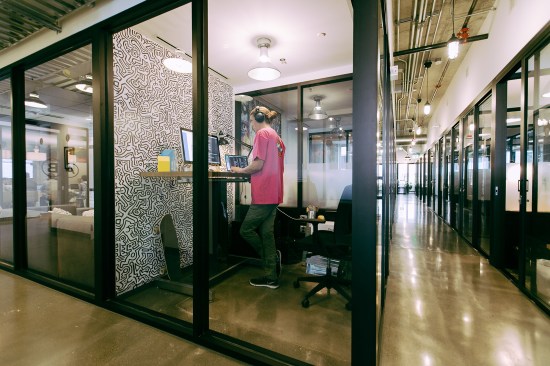WeWork's scale means it also has the ability to influence product manufacturing. The company uses miles of aluminum storefront systems to delineate spaces. WeWork director of building research Jason Andersen said the company has designed a frame whose section requires 16 percent less aluminum than the current product—saving both shipping and material costs. The company is also experimenting with the thickness of the glass lites to modulate reverberation.