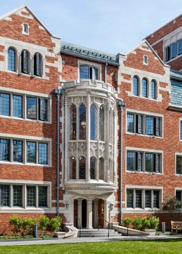 This staircase is the main feature of a courtyard in Pauli Murray College, and is detailed with an ornament scheme based on DNA. All of the stone work was completed by hand.